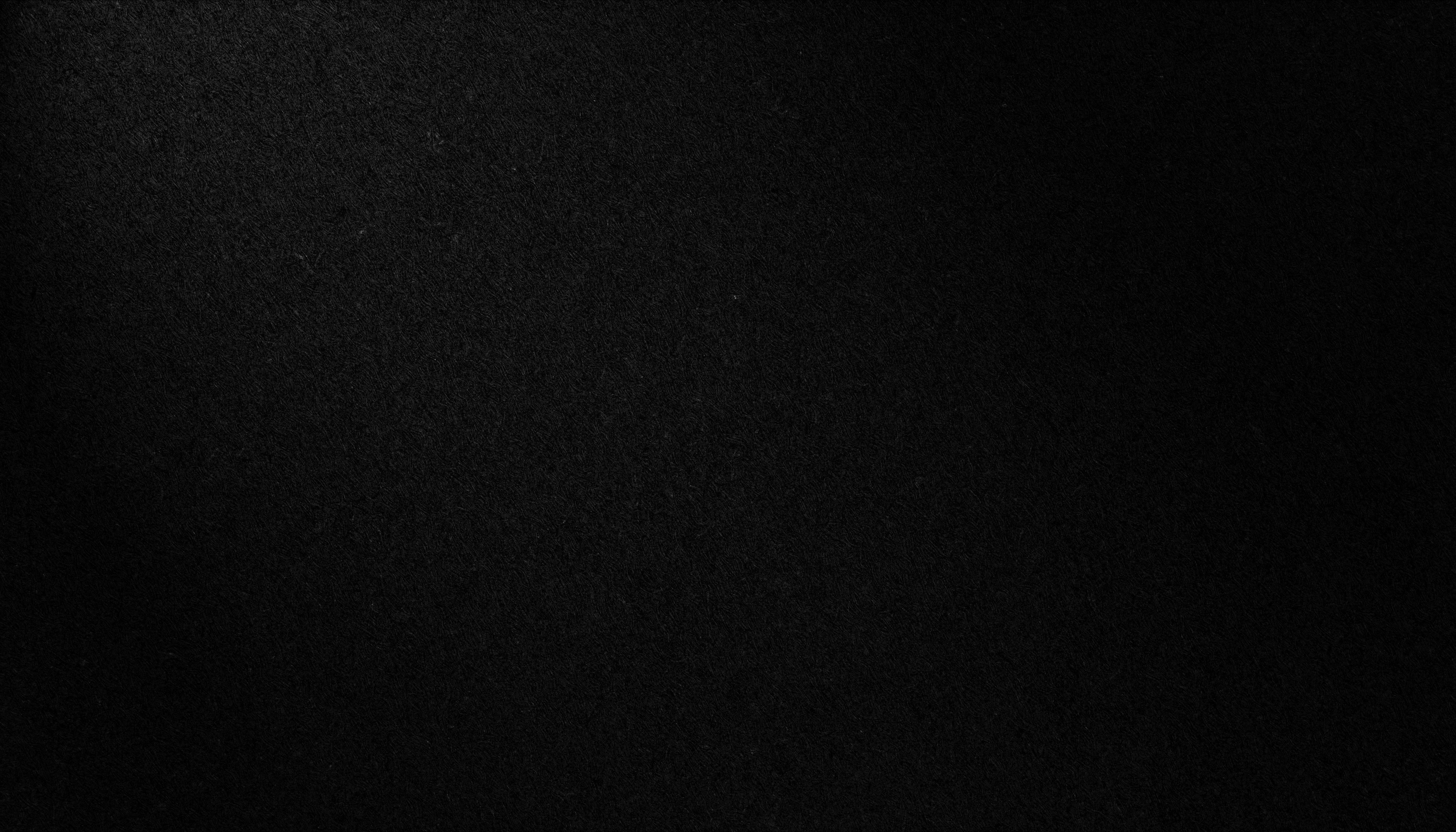 Textured Black Paper Background